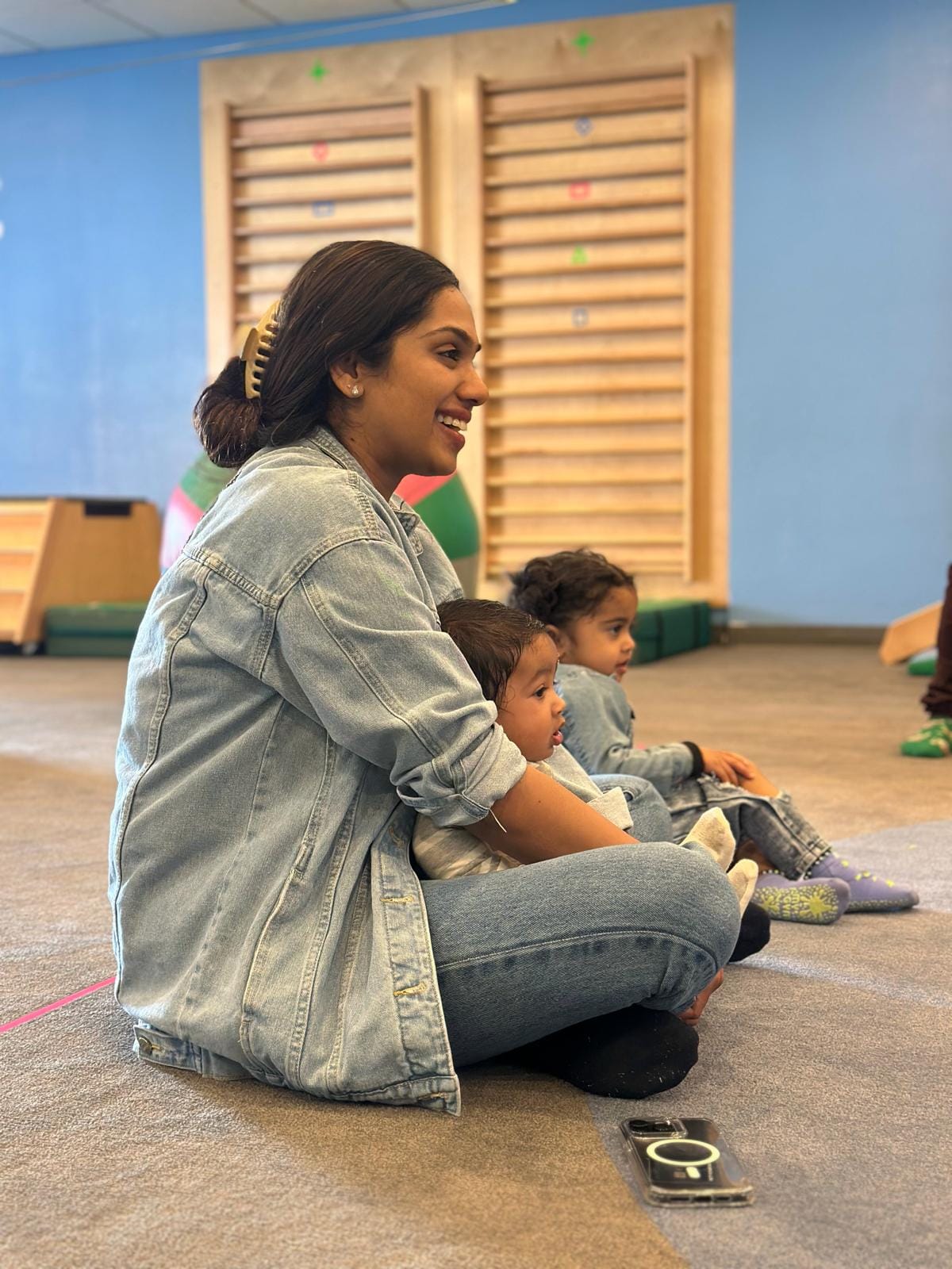Pretty with children in Montessori classroom
